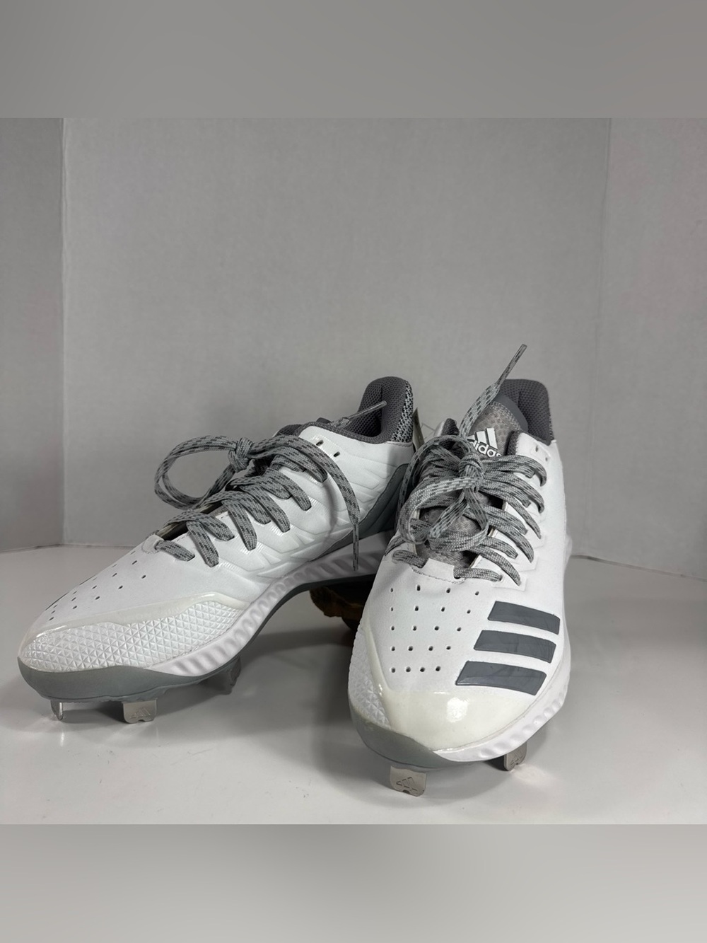 adidas women’s White and Gray Athletic Cleats
